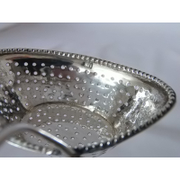 Antieke zilveren strooilepel