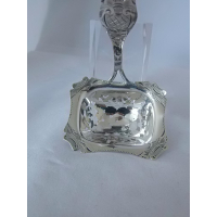 Zilveren strooilepel