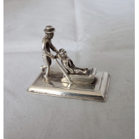 zilveren miniatuur Sleetje rijden